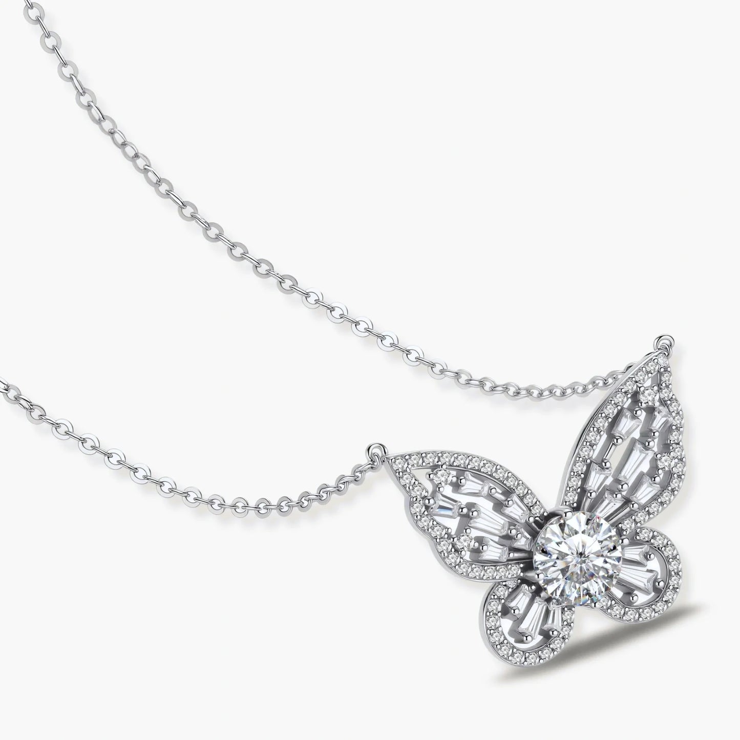 Sterling silver butterfly pendant with radiating design and central moissanite stone on adjustable chain