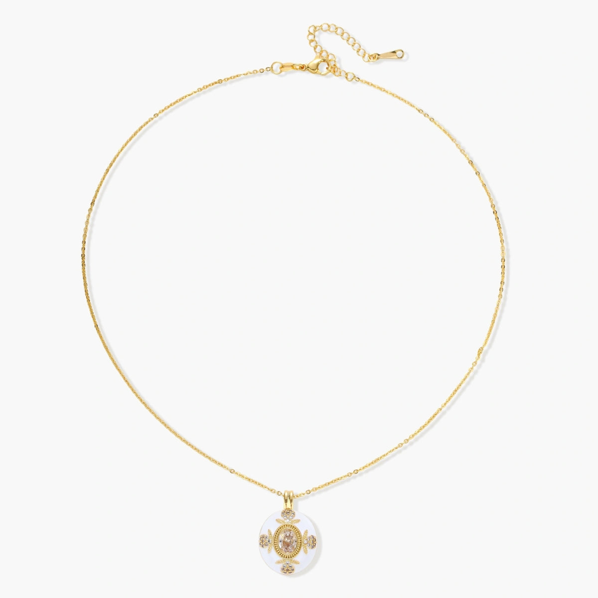 Gold-plated necklace with circular white enamel pendant featuring central zirconia stone and ornate decorative details